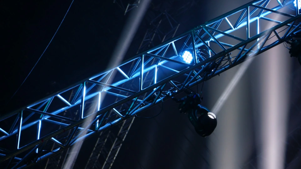 a stage set up for a concert with blue lights